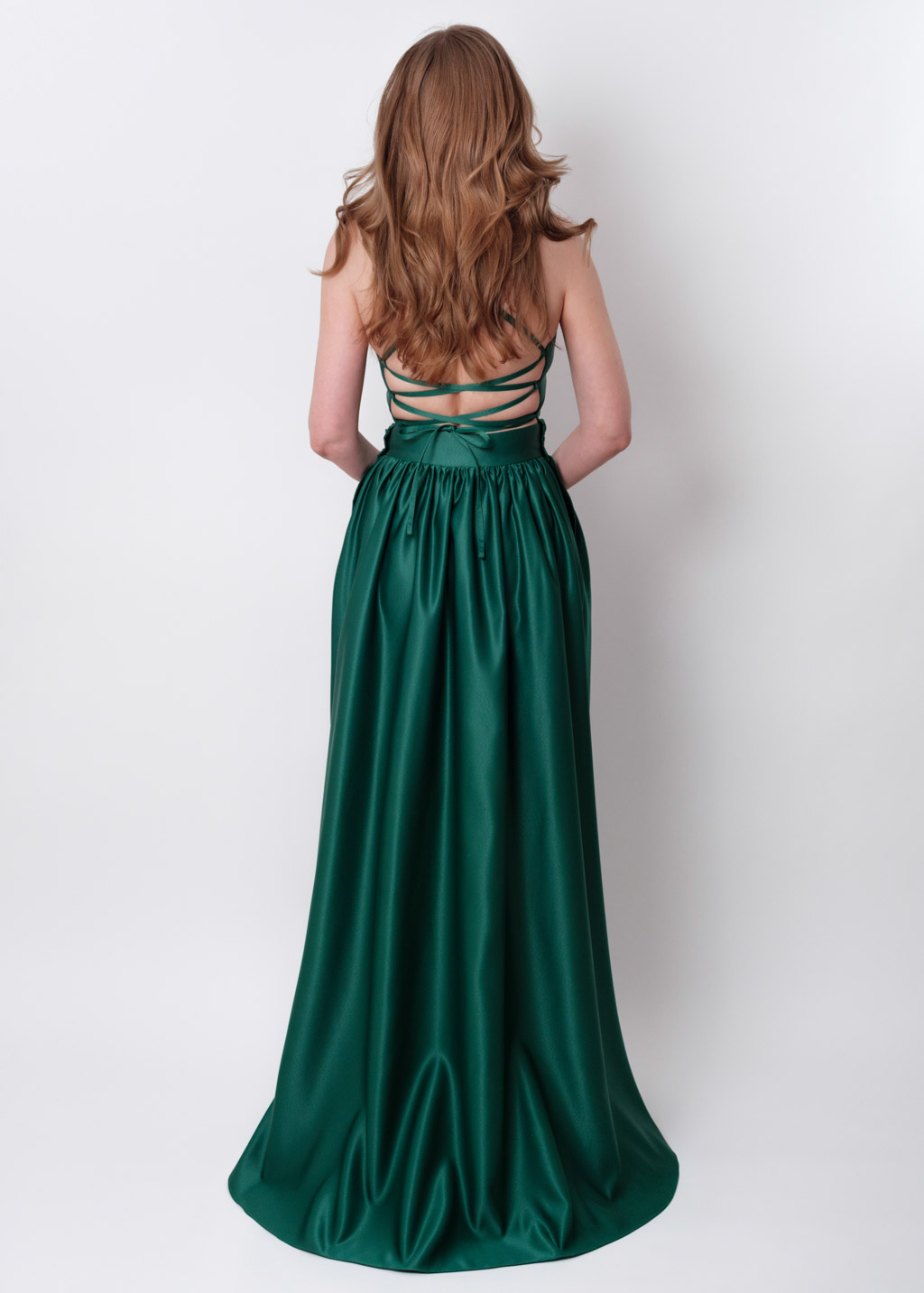 Emerald green slit satin open back dress