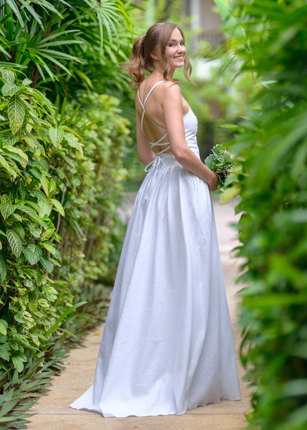 White slit linen dress with open back