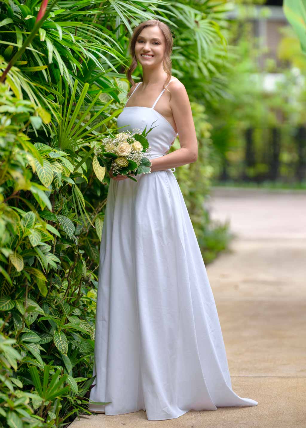 White slit linen dress with open back