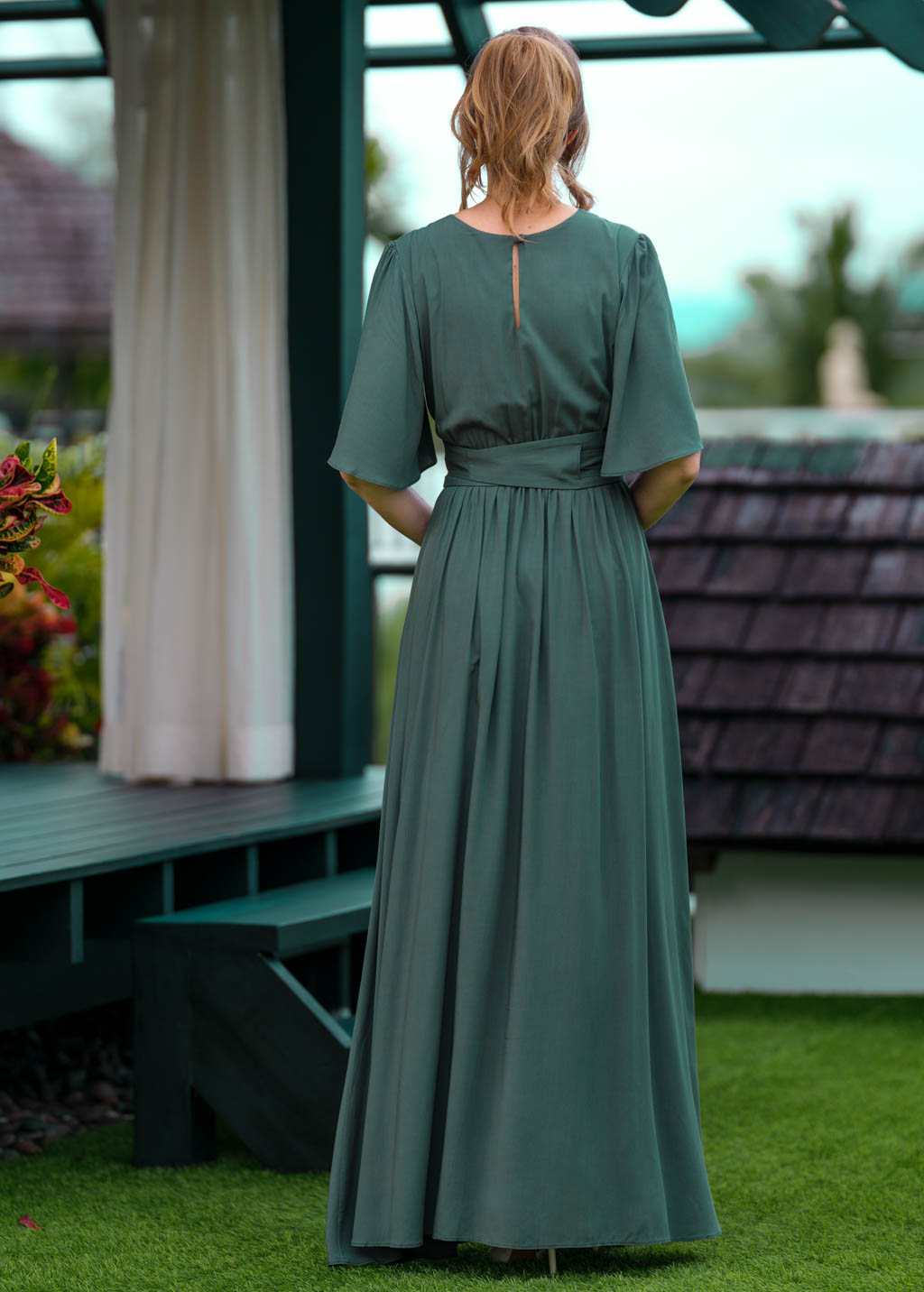 Dark green slit dress with belt