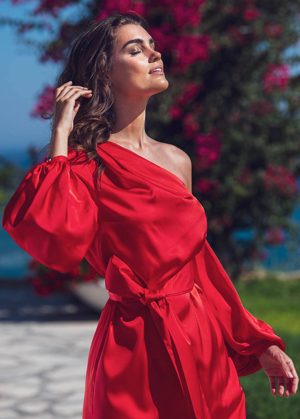 Red open shoulder silk dress with belt